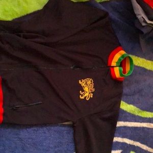 Men’s zip up sports style jacket. Rasta colors